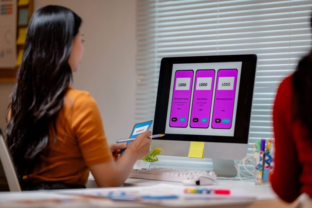 asian web designer developing mobile application u 2025 09 10 04 16 20 utc scaled.jpg