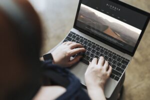 Home - Agency woman working on a laptop 2025 02 10 09 42 03 utc scaled.jpg