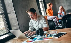 Home - Agency young cheerful photographer 2025 03 26 05 06 35 utc scaled.jpg