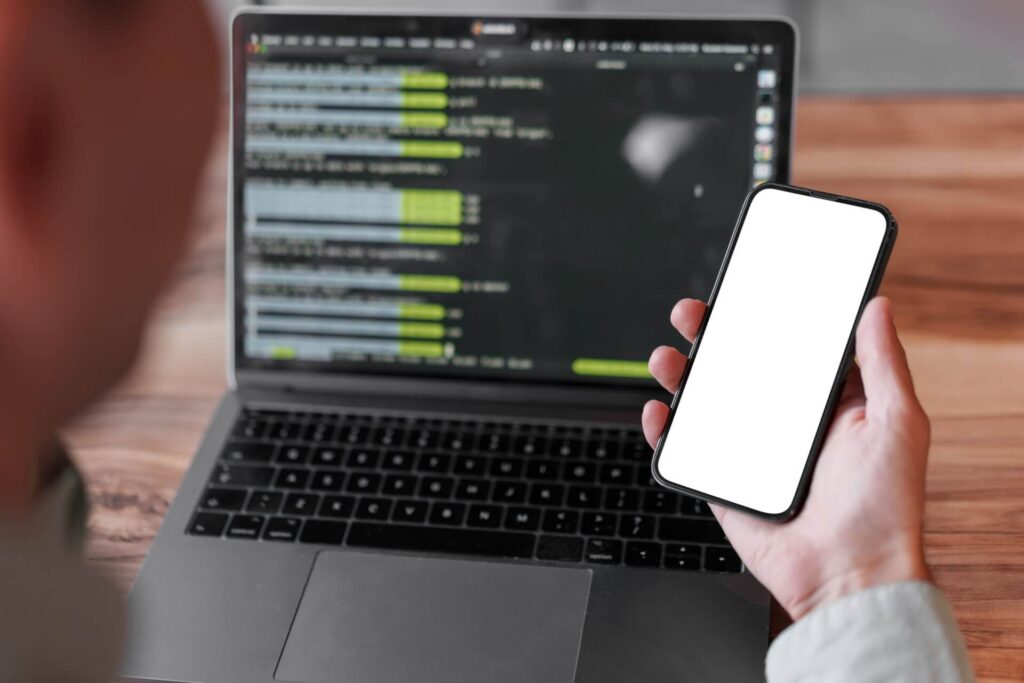 young man using his laptop in cafe close up 2025 02 24 14 48 57 utc scaled.jpg